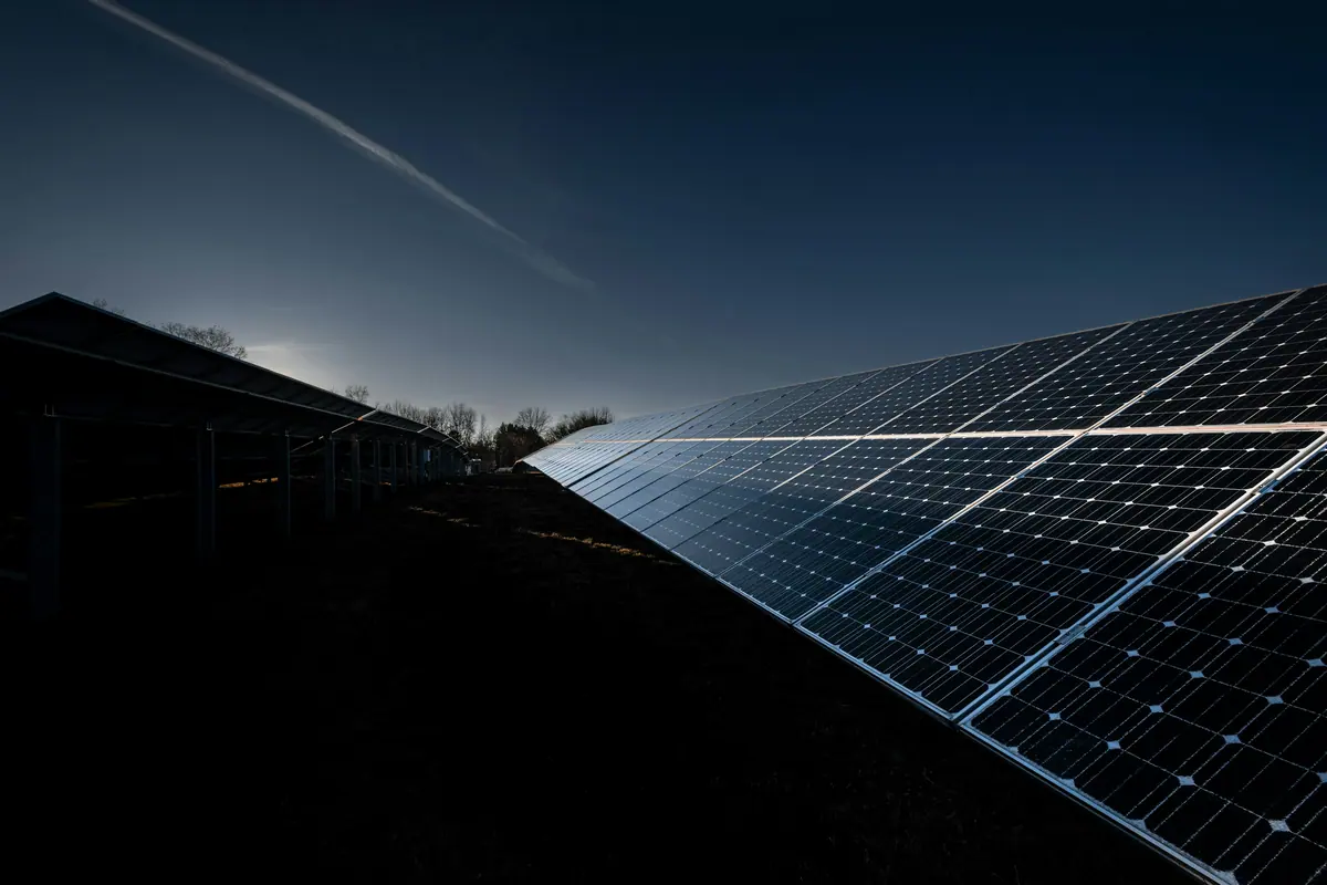 Solar panels against a low sun